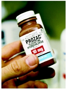 The antidepressant Prozac is used to treat depressive disorders. ( David Butow/Corbis Saba.)