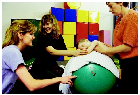 A young boy receives a massage. ( Owen Franken/Corbis.)