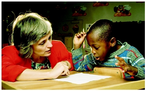 Special education student receiving one-on-one instruction. ( Richard T. Nowitz/Corbis.)